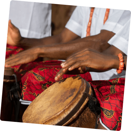 men beating drums